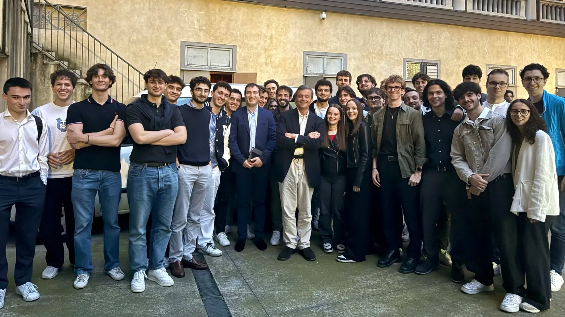 Group photo of the Pensionato Bertoni student community after a talk with a guest speaker